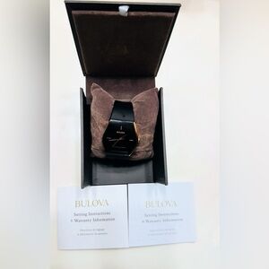 Bulova Latin Grammy Gemini Gold Stainless Steel with Black Silicone Strap.